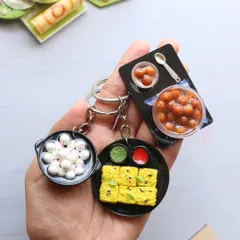 My bestselling keychains of the week: dhokla, kuzhi paniyaram, and gulab jamun.