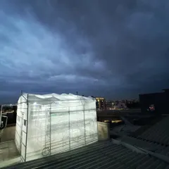 This is one of my custom setups, glowing against the evening sky. It shows how a productive farm can fit perfectly into an urban space, turning an unused corner of a roof into a source of fresh, clean food.