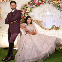 Wrapped in sparkle and love for their engagement. The bride's shimmering lavender ball gown and the groom's coordinated suit create a glamorous and memorable look.