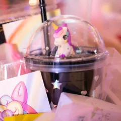It's all about the little details. These unicorn-themed party favors, complete with custom cups and gift boxes, are an example of how I ensure every part of an event is perfectly on-theme.