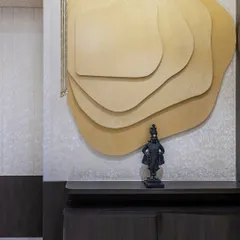 The dawn of devotion meets modern elegance. I designed this stunning home temple in a Thane apartment with a contemporary rising sun backdrop, creating a tranquil space where peace and inspiration seamlessly blend.