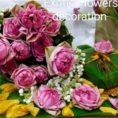 A traditional Indian floral arrangement featuring beautifully folded pink lotus buds. This type of decoration is ideal for religious ceremonies, festivals like Ganesh Chaturthi, or auspicious occasions.