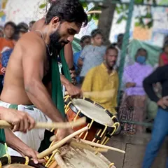 An intense, up-close moment during a live performance. This is the focus and power that goes into every single beat of the drum.