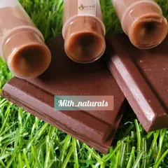 My homemade chocolate lip balm looks good enough to eat. It's made with cocoa butter and vitamin E to give your lips long-lasting hydration and nourishment.