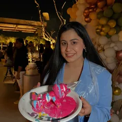 This guest chose a vibrant pink and blue combination for her fluid art teddy bear at a baby shower party. Each creation is completely unique.