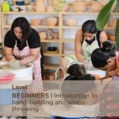 A view of our beginner level course in action, where students get a foundational introduction to both hand building and wheel throwing techniques.