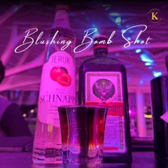 The 'Blushing Bomb' shot, a potent and delicious mix of Jägermeister and peach schnapps, is always a party starter.