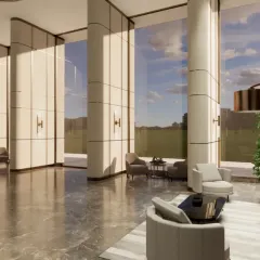 This expansive lobby is designed to inspire awe. Soaring columns, polished marble floors, and floor-to-ceiling windows create a grand entrance that sets a tone of luxury and sophistication for the entire building.
