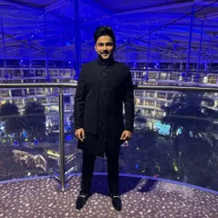 A custom blue Indo-western outfit designed for a party. The sleeves and front panel feature intricate salli pipe work for a touch of handcrafted detail.