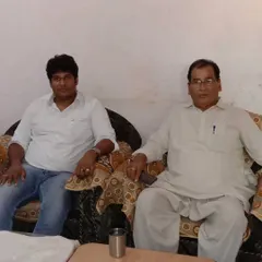 Meeting with clients and their family members helps me understand the complete situation. Here, I am discussing a case with a client and his father to prepare our legal strategy.