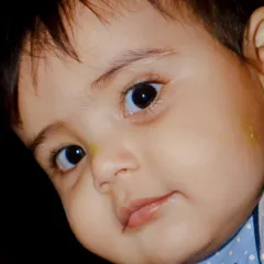 An intimate close-up portrait of my nephew, Ibrahim, capturing the innocence and curiosity in his big, beautiful eyes. I believe the most powerful kids' portraits are the ones that feel up-close and personal.