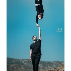 A playful and surreal creative portrait using reflections. This "upside down" shot is a fun and unique way to capture a couple's connection, creating an image that makes you look twice.