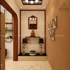 This traditional pooja corner is simple yet profound, with a small wooden mandir, brass lamps, and ethnic artwork creating a sacred and peaceful atmosphere.