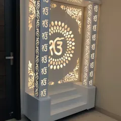 The mandir unit is designed to be a standalone piece of furniture that fits perfectly into a corner of the home.