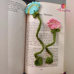 The Dainty Flower bookmarks feature long, leafy stems and delicate blossoms, adding an elegant touch to your reading.