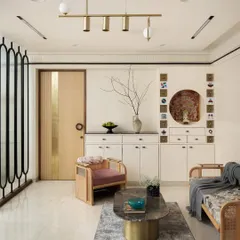 The formal living area features a custom-designed sofa, lounge chair, and center table from my 'Objects by Soch' collection. The space also incorporates a Jain mandir, respecting the client's beliefs with beautiful, integrated design.