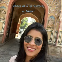 A common question I get is "Where do I shop in Jaipur?" This post is your ultimate guide. Here I am at the iconic city palace, ready to take you on a shopping tour.