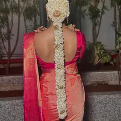 A full back view of the magnificent South Indian floral braid. The combination of fragrant flowers and ornate jewelry is truly breathtaking.