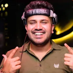 A happy, smiling shot of me at the decks. My VDJ nights are about bringing the fun and flair of Bollywood music videos to the club, creating a unique and engaging party that fans love.