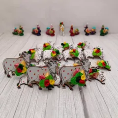 A beautiful Haldi Kumkum set featuring cow and peacock designs. These are unique and auspicious return gifts for any occasion.