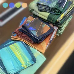 This image gives a behind the scenes glimpse of a fresh batch of my 'Panchabhuta' pocket squares and scarves. You can see the variety of color stories, each inspired by one of the five elements: earth, fire, water, air, and space.