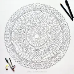 The complete line work for the large magenta mandala before any color was added. This is the foundational drawing, which takes hours of precise, geometric work.