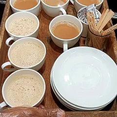 A simple tray of freshly brewed tea and coffee, ready to be served. My beverage service is perfect for corporate meetings, high-tea events, or as a warm welcome for your guests.