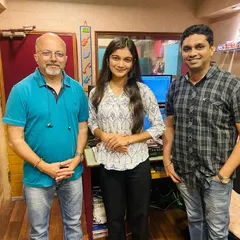 Standing with my collaborators after a successful recording session for a Ganpati song. Working with experienced artists is always a huge learning experience for me.