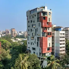 The J-House stands as a quiet counterpoint to the dense urban fabric of Mumbai. It is an exploration of vertical living that prioritizes natural light, ventilation, and a connection to the sky, using deep verandahs and screens to mediate the relationship with the city.