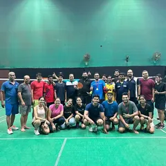 The happy faces of our adult batch players after a successful tournament day. We foster a strong sense of community among players of all ages.