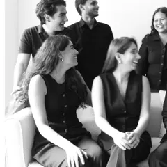 Behind every idea is a team making it real. This is a part of our crew, sharing a laugh during a studio photoshoot.