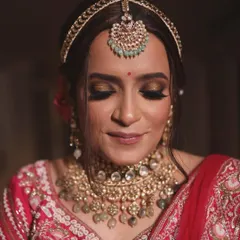 A close-up on the eyes tells the whole story. I guided my student in creating this soft, smokey bridal eye with a touch of shimmer for our bride Nilofer.