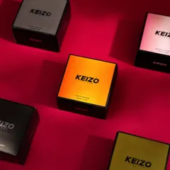 A flat-lay of the "Keizo" product line, showcasing the different packaging designs on a rich red background.
