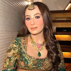 A close-up of the stunning Mehendi makeup, showcasing the dual-tone eyeshadow and flawless base.