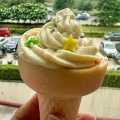 A close-up of my ice cream cone soap, one of my most popular artisanal designs. This one features a vanilla-colored scoop with tiny star sprinkles.