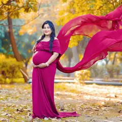 An outdoor session with one of my flowing maternity gowns is pure magic. The vibrant color and the toss of the fabric in a natural park setting make for such a joyful and powerful portrait.