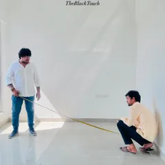 Measuring the floor space to plan the furniture layout and ensure optimal flow and movement within the room.