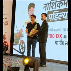 Being felicitated on stage after my live sand art show for a Honda bike launch in Nashik. I created two different stories with sand to connect with both family and youth audiences.