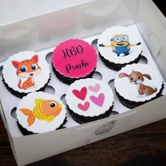 A sweet and simple birthday box perfect for any age. This set features cute, colourful cartoon characters like a minion, a cat, and a dog on edible toppers, making for a cheerful and fun gift.