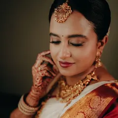 A soft and elegant bridal portrait. Capturing the bride with her eyes closed in a moment of quiet contemplation adds a touch of serenity and grace.