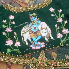 An example of my hand-painted blouse artistry, featuring a depiction of Lord Krishna. Each painted blouse is a wearable piece of art, combining spiritual motifs with traditional embroidery for a truly unique statement.