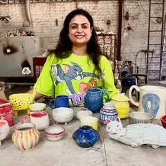 Look at that smile and the amazing collection of first-time creations! From a quirky cat sculpture to colorful mugs and bowls, this is what pure, unfiltered creativity looks like. This is what my studio is all about.