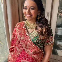 Another shot of the radiant mom to be. Her skin looks fresh and dewy, and the soft makeup enhances her natural beauty.