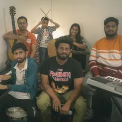 One of our student bands posing for a photo during a practice session. This is where they build chemistry and perfect their sound.