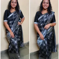 A demonstration of the most common and versatile style, the basic 'Ulta Pallu' or Nivi drape. This black and silver saree is draped for a clean, modern look suitable for any party or formal event.