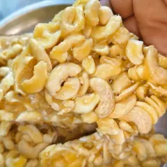 This is my homemade Kaju Chikki, a special customized order. It is made with high-quality cashews, pure jaggery, and a touch of homemade ghee, with absolutely no artificial colors or sugar.