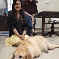 Learning from pioneers in the field is a privilege. Here I am with my mentor, Shirin Merchant, and one of the resident dogs during my certification course. My education is grounded in understanding canine behavior deeply, not just giving commands.