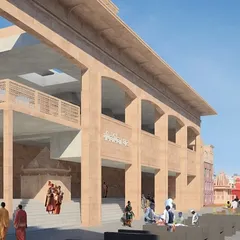 A closer perspective of the ghats, showing the multi-level design with open-air corridors and steps leading to the water. The architecture is designed to manage large crowds while ensuring a smooth and dignified process for families.