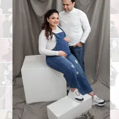 This is a great example of a relaxed couple's portrait from a casual studio session. Using simple props like these white blocks adds visual interest while keeping the focus on the couple's happy, easygoing connection.