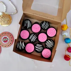 This box is pure fun. It combines pink Bubblegum flavored chocolates with dark Oreo Crunch chocolates, decorated with swirls and stripes. It’s a favorite for those who love nostalgic flavors.